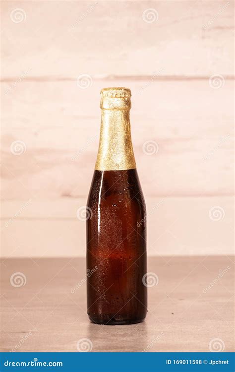 A Bottle Of Blonde Beer And A Bottle Of Amber Beer Lying Down Stock Image Cartoondealer