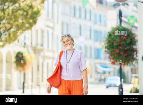 Outdoor Fashion Portrait Of Stylish Mature Year Old Woman With Grey Hair Stock Photo Alamy