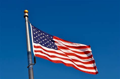 American Flag Blowing In Wind Photograph By Brandon Bourdages Pixels