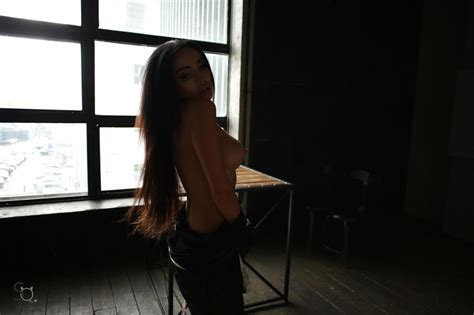 Busty Brunette With A Great Body Poses Naked Next To The Window IamXXX