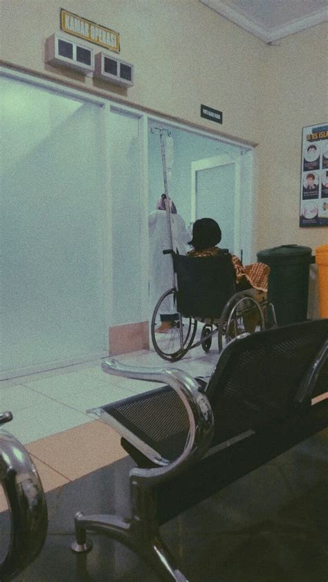 A Person In A Wheel Chair At An Airport