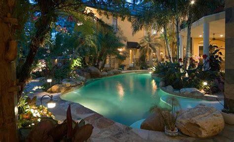 15 Relaxing and Dramatic Tropical Pool Designs | Home Design Lover