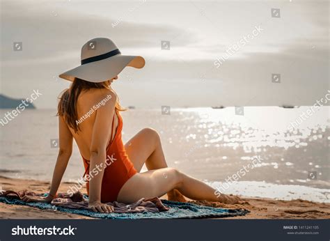 Beautiful Women Wearing Bikini Sitting On Stock Photo 1411241105 Shutterstock