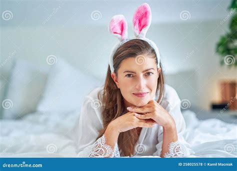 Nice And Brunette On Bed With Bunny Ears Stock Photo Image Of Alone Easter
