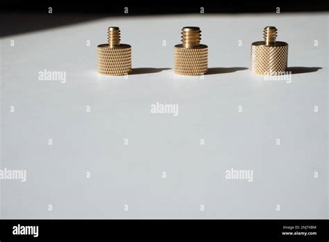 Row Of Camera Mount Hot Shoe Tripod Adapter Screws On White Background Stock Photo Alamy