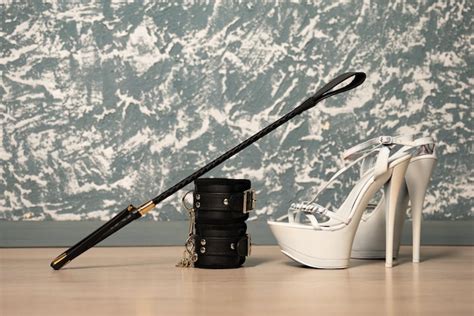 Premium Photo Adult Sex Games Kinky Lifestyle Pair Of White Highheeled Shoes With Spank And