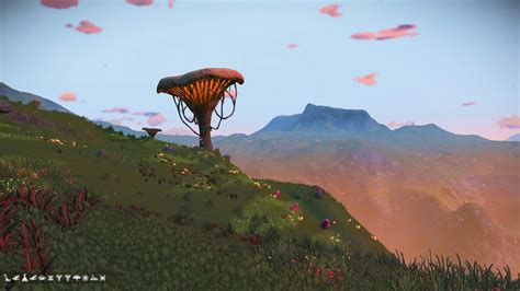 Earth like Highland planet with green grass and glowing plant life at