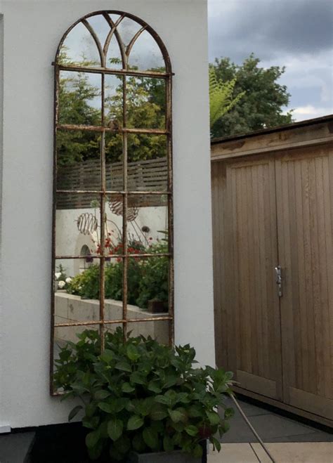 tall decorative full arch mirror