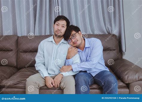 Asian Gay Couple Sitting On A Sofa Arguing On Something Stock Photo Image Of Asian Life