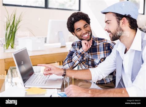 Happy Gay Couple Using Laptop Stock Photo Alamy
