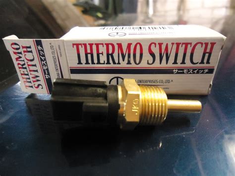 Replacing the coolant temperature sensor in the Mitsubishi Lancer 9