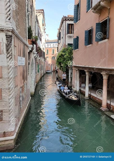 Venice, Italy - October 5, 2023: Tourists Floating in a Gondola in