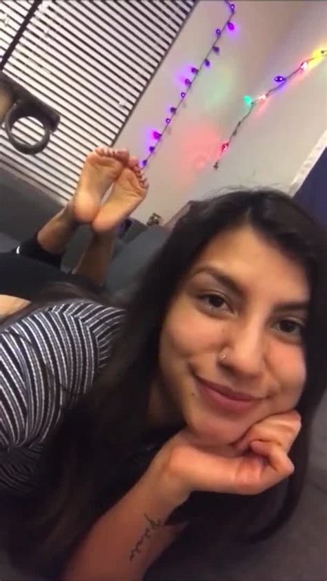 Attractive Brunette With A Nose Ring Showing Off Her Delicious Feet And Toes Feet