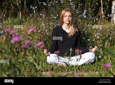 Lotus yoga pose Stock Photo - Alamy