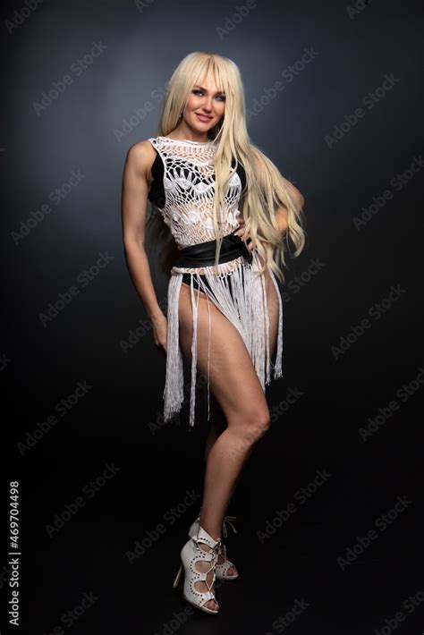 Sexy Blonde Woman Posing Wearing Black Sensual Lingerie Looking At Camera Stock Photo Adobe