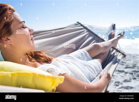 Brunette Relaxing In The Hammock Stock Photo Alamy