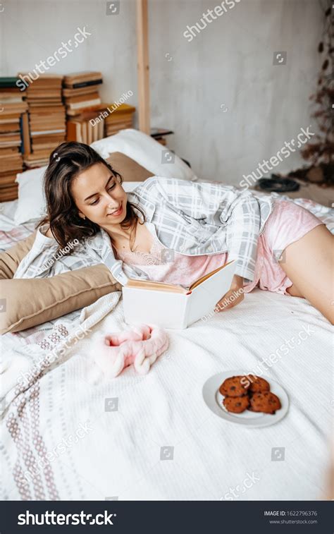 Brunette Girl Lying Bed Reading Book Stock Photo Shutterstock