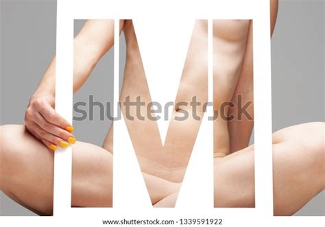 Nude Female Body Behind Stencil Letter Stock Photo Shutterstock