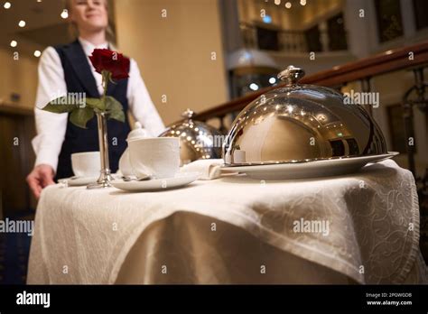 Friendly Waitress Delivers Hot Food To The Room On Trolley Stock Photo Alamy
