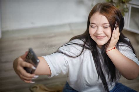 Modern Stylish Chubby Student Brunette Girl Taking Selfie With Cell Mobile Phone Picture Of