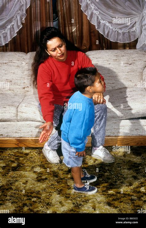 Hispanic Mother Spanks Son Stock Photo Alamy