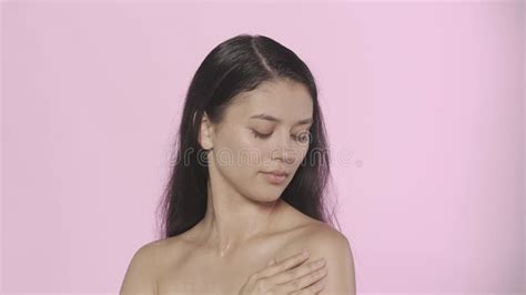 Closeup Studio Shot Of Beautiful Female Model Brunette Girl With Long Hair And Nude Makeup