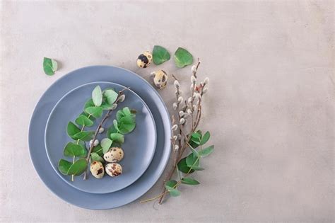 Premium Photo Eucalyptus And Pussy Willow Twigs With Quail Eggs On Plate As Decor For Easter
