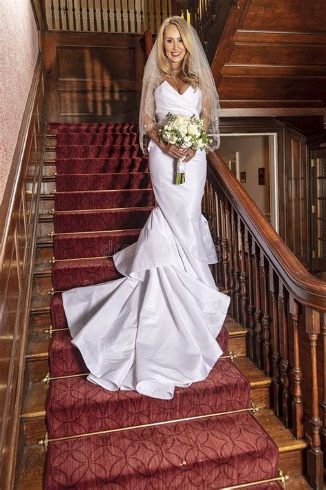 Lovely Blonde Bride Posing For Her Wedding Portraits Stock Image Image Of Garment