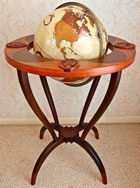 custom handmade sculptural wood globe stand