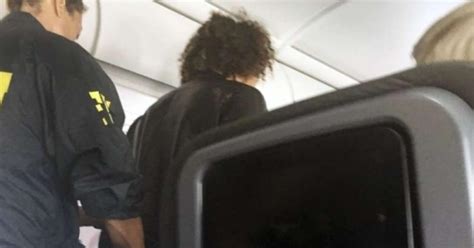 American Airlines passenger duct-taped to seat by fellow passengers