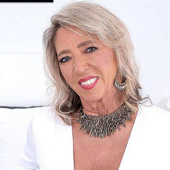 Horny Granny Lacey West Stuffs Her Wet Pussy With A Big Dildo 17 Photos