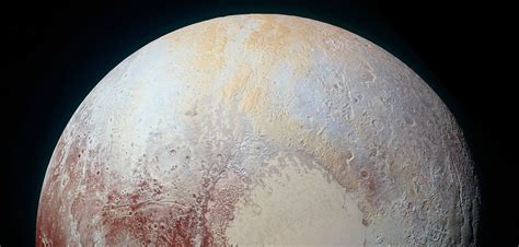 Photo A Color Enhanced Photo Of Pluto Taken By The New Horizons