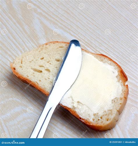 Butter On A Slice Of Bread Stock Image Image Of Value 25391851