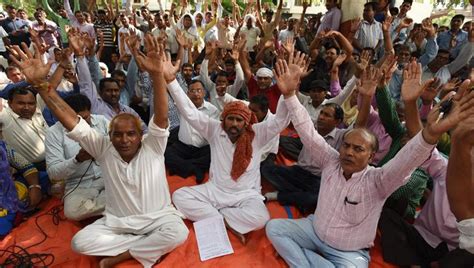 Workers Protest Semi Naked Against State Govt For Restoration Of Jobs