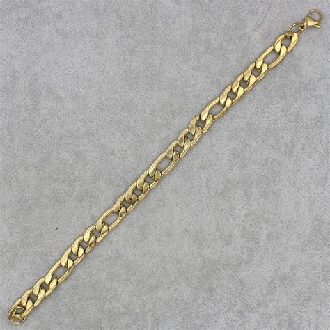 Браслет мужской искаженный золотистый Stainless Steel из медицинской ...