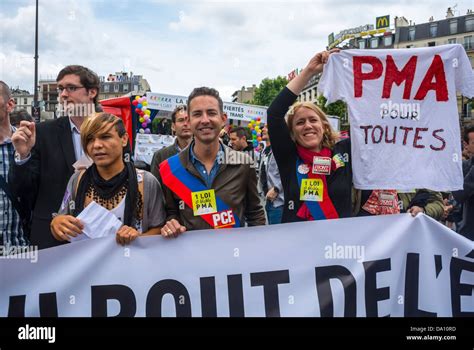 Paris France LGBT Groups Marching In Annual Gay Pride March Woman Holding PMA M A P Slogan