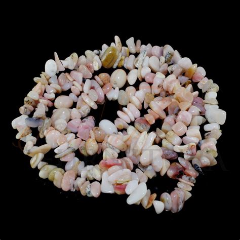 Бусины натурального розового опала свободной формы. Размер бусин - 5-12мм