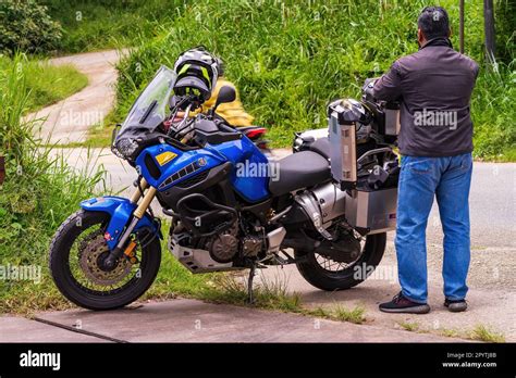 The Super Tenere 1200 Yamaha Motorcycle Parked On The Roadside In