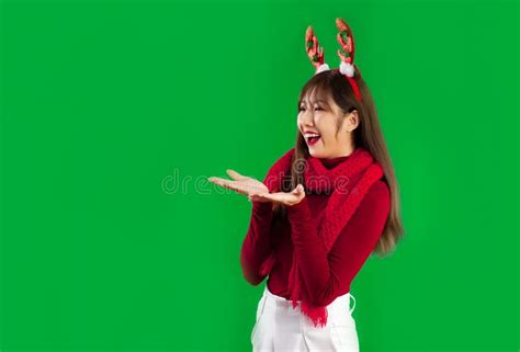 Christmas Concept Young Pretty Asian Woman In Red Sweater And Scarf