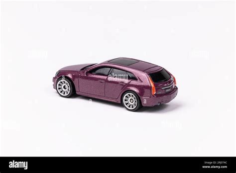 A Closeup Shot Of A Purple Hot Wheels Cadillac Cts V Isolated On A White Background Stock Photo