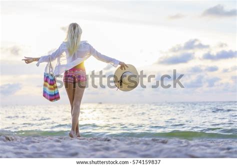 Blonde Woman On Beach Sunset Stock Photo Edit Now