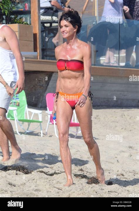 Hot New Maggie Wheeler Bikini Pics