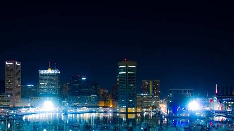 Download Strong Light At Night In Baltimore Wallpaper | Wallpapers.com