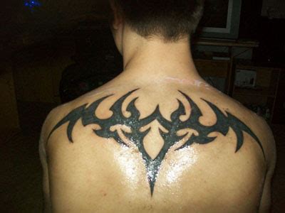 Tribal back tattoos designs | Sopho Nyono