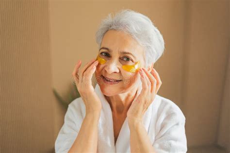 Eye Patch Beauty Aging Treatment Mature Adult Old Woman With Under Eye Collagen Pads Stock