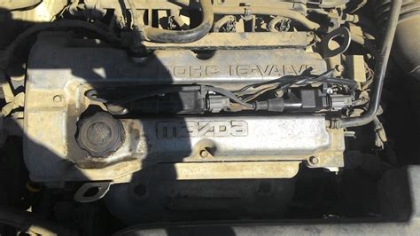 Замена катушки зажигания — Mazda Familia (BJ), 1,5 л, 2003 года ...