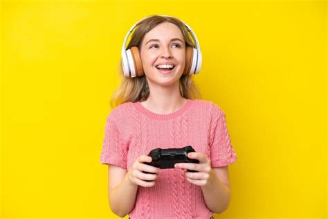 Premium Photo Blonde English Young Girl Playing With A Video Game