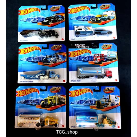 Hot Wheels Track Fleet Optimus Prime Volvo Rad Rider Semi Rodger Fuel Fire Speed