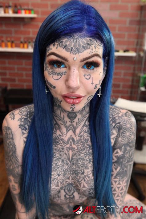 Inked Babe With Blue Hair Poses At The Tattoo Shop Photos