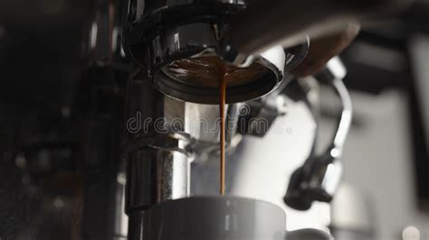 Low Angle Of Pulling Espresso Shot With Naked Portafilter Stock Photo Image Of Filter